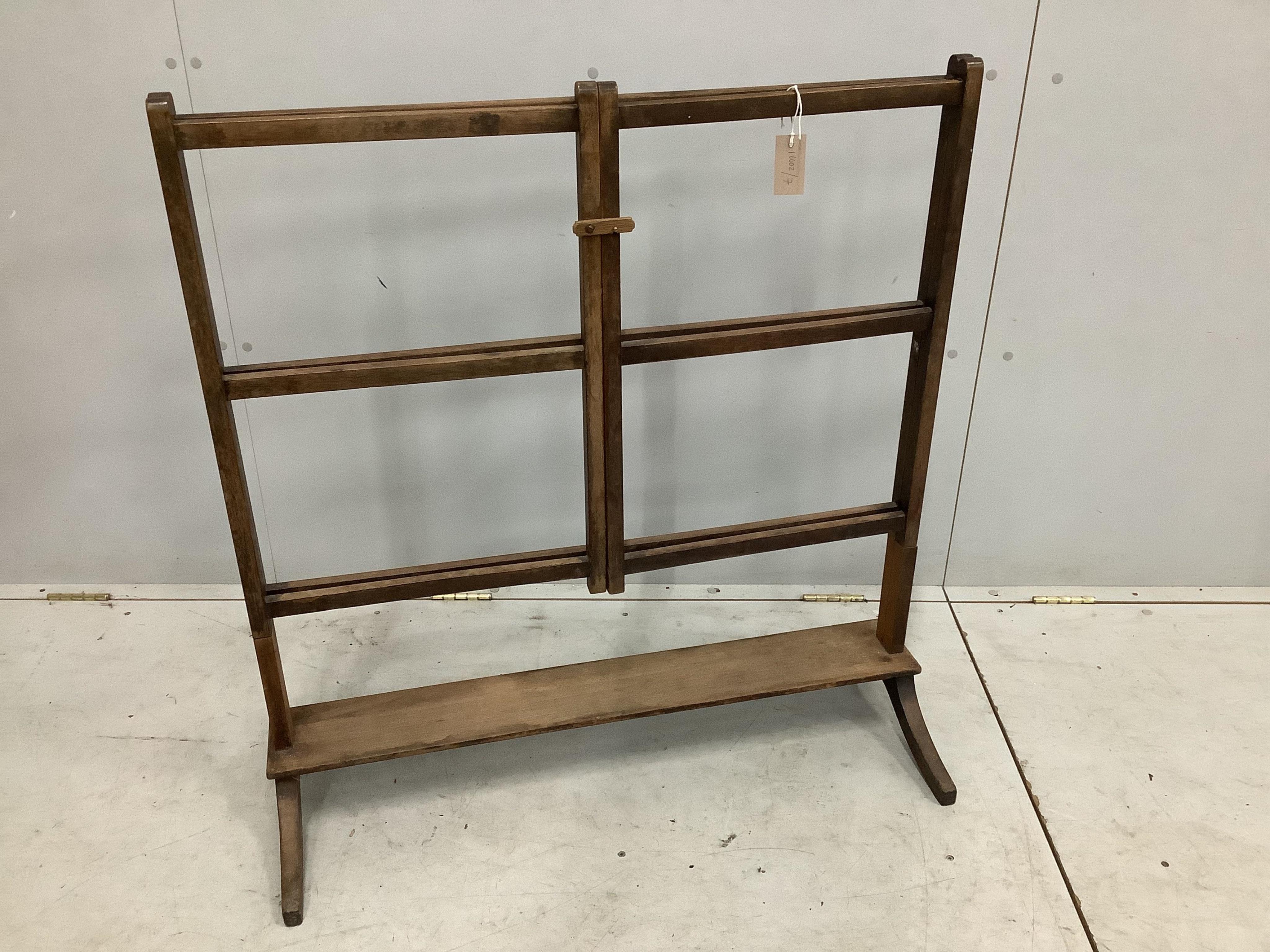 A Victorian bleached mahogany folding towel rail, width 93cm, depth 38cm, height 97cm. Condition - poor